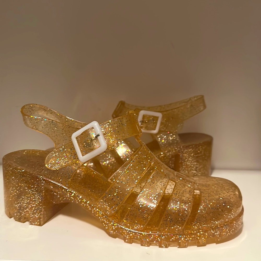 Nude/light orange sparkly heeled jellies! Adorable for festivals/parties